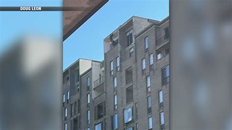 Window washer rescued in Brookline after hanging from 12th floor of apartment building